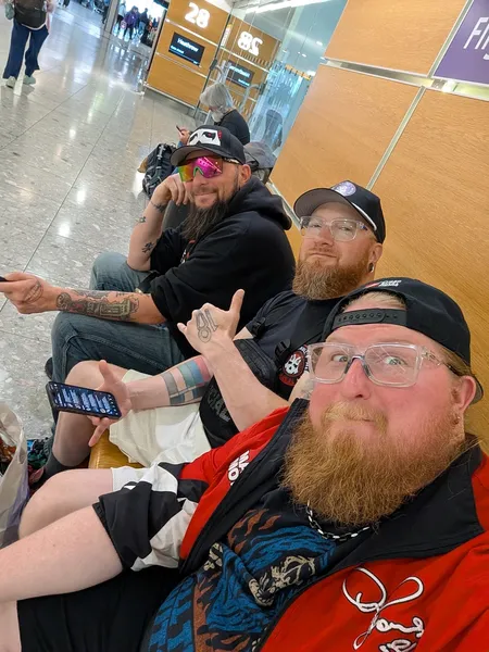 Waiting to board our first flight home!